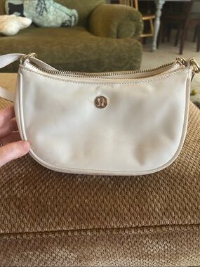 lululemon athletica Cream Small Crossbody Bag with Gold Logo